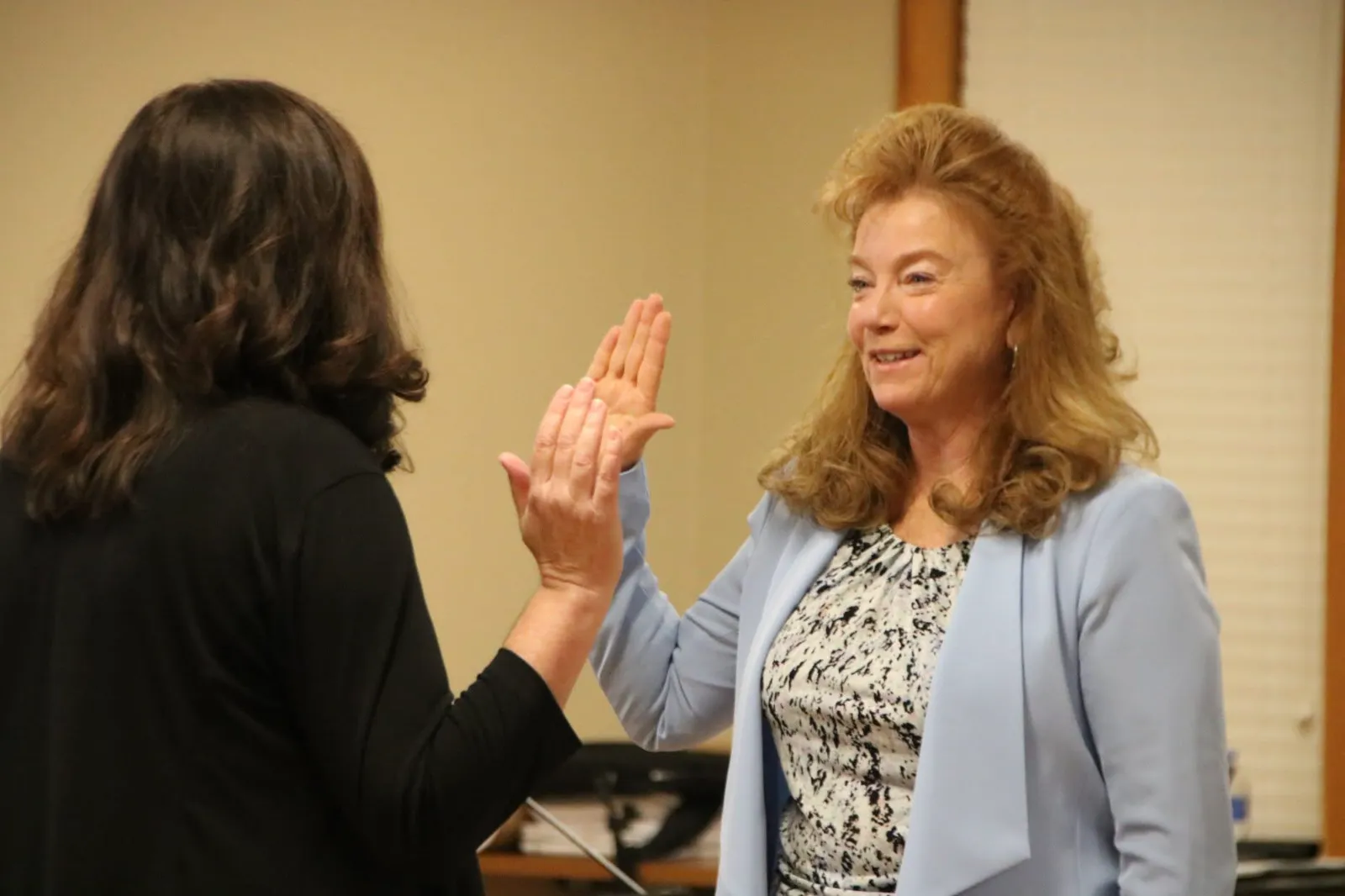Colleen Whitlow taking the oath of office