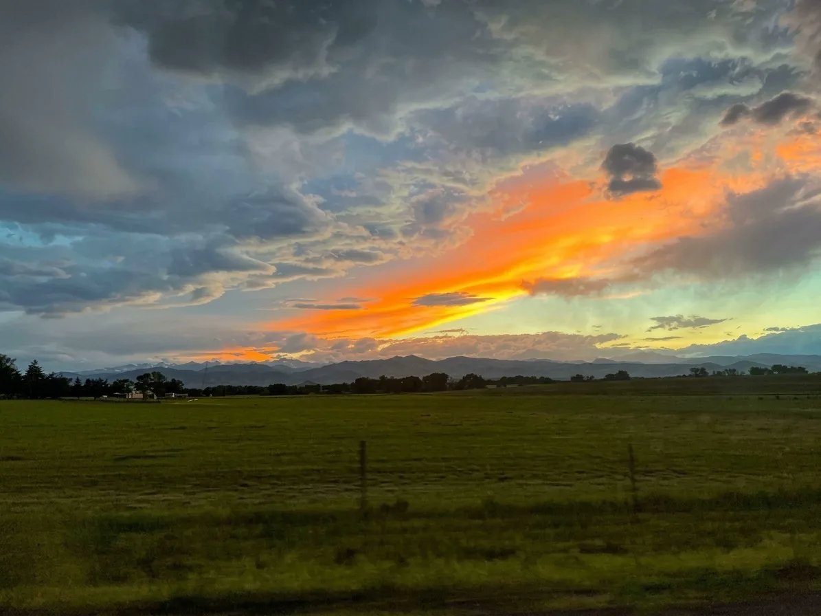 Sunset over the Front Range and farm fields near Mead